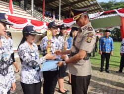 Wakapolres Jembrana Hadiri Peringatan HUT KORPRI Ke-52 dan HUT PGRI Ke-78 di Stadion Pecangakan