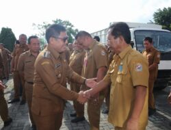 Perdana Pembina Apel Gabungan Pj. Bupati Tapanuli Utara Tekankan Sinergitas Membangun Roda Pemerintahaan Tapanuli Utara