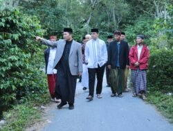 Ahad berkah, Pj. Bupati Haili Yoga Santuni Masyarakat Kurang mampu di Kampung Uning Bertih Kec. Wih pesam.