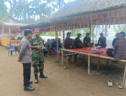 Sinergritas TNI-Polri dalam Pengamanan Kegiatan Pengabenan di Desa Nawa Kerti