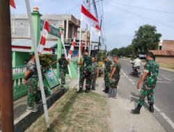 Sambut Kemerdekaan RI Ke 79, Koramil Jajaran Kodim 0103/Aceh Utara Pasang Bendera Dan Umbul Umbul.