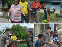 Personel Satgas Humas Operasi Damai Cartenz 2025 Bagikan Susu, Anak-Anak Papua Harus Tumbuh Sehat, Cerdas, dan Bahagia