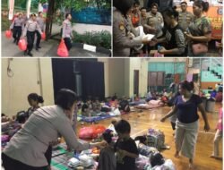 Personil Polda Metro Jaya Bagikan Makanan, kepada Ratusan Korban Terdampak Banjir di Jakarta