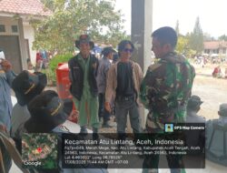 Babinsa Koramil 07/Atu Lintang Laksanakan Komsos dengan Anggota Linmas di Desa Merah Mege