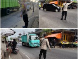 Rutinitas Personil Polsek Rendang Melaksanakan Pos Pagi Atensi Kegiatan Masyarakat, di Simpang 4 Pasar Rendang