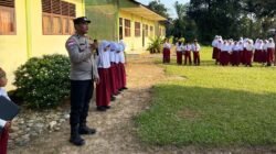 Peduli Generasi Penerus, Kanit Binmas Polsek Simpang Jernih Jadi Pembina Upacara Bendera di SDN Simpang Jernih