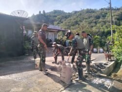 Babinsa Koramil 08/Silih Nara dan Satgas Gulbencal Perbaiki Parit dan Jembatan di Burni Bius