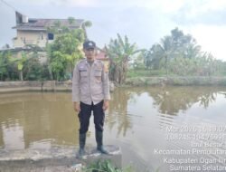 Polsek Pemulutan Lakukan Pemantauan Debit Air Sungai, Situasi Masih Aman dan Terkendali