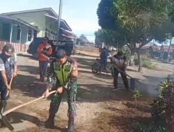 Babinsa dan Warga Gotong Royong Bersihkan Halaman Kantor Reje di Pantan Damar