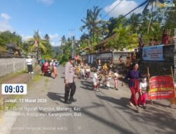 Tanamkan Kelestarian Budaya Sejak Dini, Bhabinkamtibmas Amankan Pawai Ogoh-Ogoh Cilik TK Negeri Macang