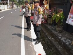 Bhabinkamtibmas Desa Pering Sari bersama Anggota Tersprin, Pecalang Desa Adat Padangaji Memberikan Pengamanan Upacara perkawinan