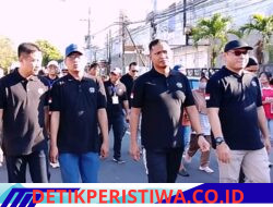 Masyarakat Memadati Jalanan Pusat Kota, Dalam Kegiatan Jalan Sehat Hari Buruh Internasional May Day di Jember.