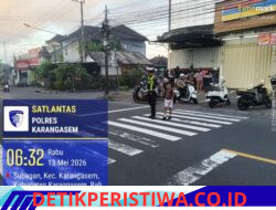 Cegah Lakalantas, Anggota Lantas Polres Karangasem Bantu Sebrangkan Siswa Siswi SD Negeri 4 Subagan