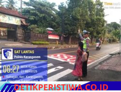 Cegah Lakalantas pada Kalangan Pelajar, Anggota Lantas Polres Karangasem Bantu Sebrangan Siswa Siswi SD Negeri 1 Subagan