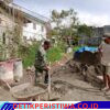 Babinsa Koramil Pegasing Bantu Warga Bangun Pondasi Rumah di Bies