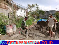 Babinsa Koramil Pegasing Bantu Warga Bangun Pondasi Rumah di Bies