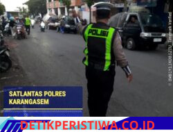 Utamakan Masyarakat Pejalan Kaki, Sat Lantas Bantu Sebrangkan Pejalan Kaki di Pasar Kesatriaan Amlapura