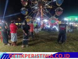 Sinergi Personil Polsek Rendang dan Pecalang Berikan Pengamanan Hiburan Musik dan Pasar malam di Desa Nongan