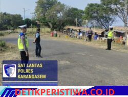 Rutinitas Harian Personel Satlantas Polres Karangasem Lakukan Gatur Lalin, di Kawasan Obyek Wisata Pantai Virgin