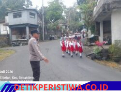 Meriahkan HUT Desa Sibetan ke-326, Lomba Gerak Jalan Tingkat SD Berlangsung Aman dan Kondusif dalam Pengawalan Polsek Bebandem