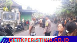 Bhabinkamtibmas Desa Telaga Tawang Bersinergi dengan Pecalang, Amankan Upacara Ngaben