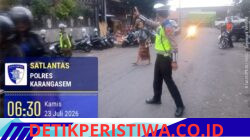 Utamakan Keselamatan Pejalan Kaki, Anggota Polres Karangasem Bantu Tugas Sebrangkan Warga Pejalan Kaki di Depan Pasar Kesatriaan Amlapura