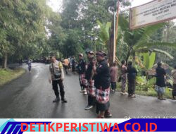 Bhabinkamtibmas Desa Sinduwati Bersama Pecalang Berikan Pengamanan Ngaben Massal di Banjar Iseh