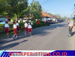 Pastikan Berjalan Lancar, Kapolsek Sidemen Pimpin Langsung Pengamanan Lomba Gerak Jalan Tingkat SD