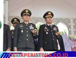 Kapolres Bireuen Mengikuti Upacara Penurunan Bendera Merah Putih HUT Ke-81 RI