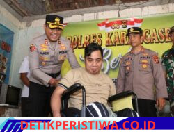 Bentuk Kepedulian Polri kepada Disabilitas, Kapolres Karangasem Serahkan Bantuan Kursi Roda kepada Warga yang Lumpuh Akibat Kecelakaan