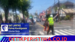 Polisi Sahabat Anak, Anggota Lantas Polres Karangasem Bantu Sebrangkan Siswa Siswi SD Negeri 4 Subagan