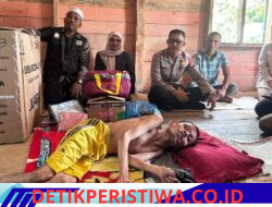 Polsek Banda Alam Dampingi Penyaluran Bantuan Kursi Roda dan Sembako untuk Warga Disabilitas