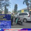 Utamakan Keselamatan Kalangan Pelajar, Anggota Sat Lantas Polres Karangasem Bantu Sebrangkan Pelajar SMPN 2 Amlapura