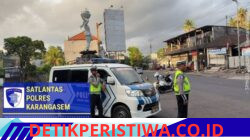 Utamakan Keselamatan Pejalan Kaki, Personil Turjawali Polres Karangasem Sigap Bantu Warga Menyeberangi Jalan Achmad Yani