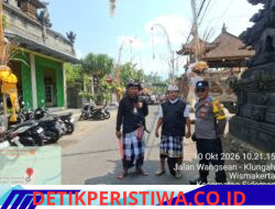 Pastikan Kegiatan Berjalan Lancar Bhabinkamtibmas Desa Wisma Kerta Bersinergi dengan Pecalang, Berikan Pengamanan Upacara Tawur Rsi Gana