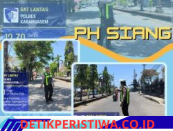 Utamakan Keselamatan Kalangan Pelajar, Personel Satlantas Polres Karangasem Bantu Sebrangkan Siswa-siswi SMPN 2 Amlapura saat Bubaran Sekolah