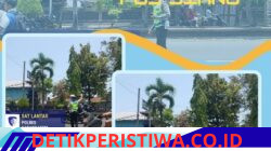 Atensi Bubaran Sekolah, Personel Sat Lalulintas Bantu Senyebrangkan Siswa-siswi SMP N 2 Amlapura
