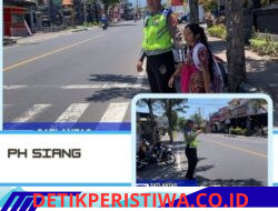 Polisi Sahabat Anak, Anggota Sat Lantas Polres Karangasem Bantu Sebrangkan Siswa-siswi SD Negeri 4 Subagan